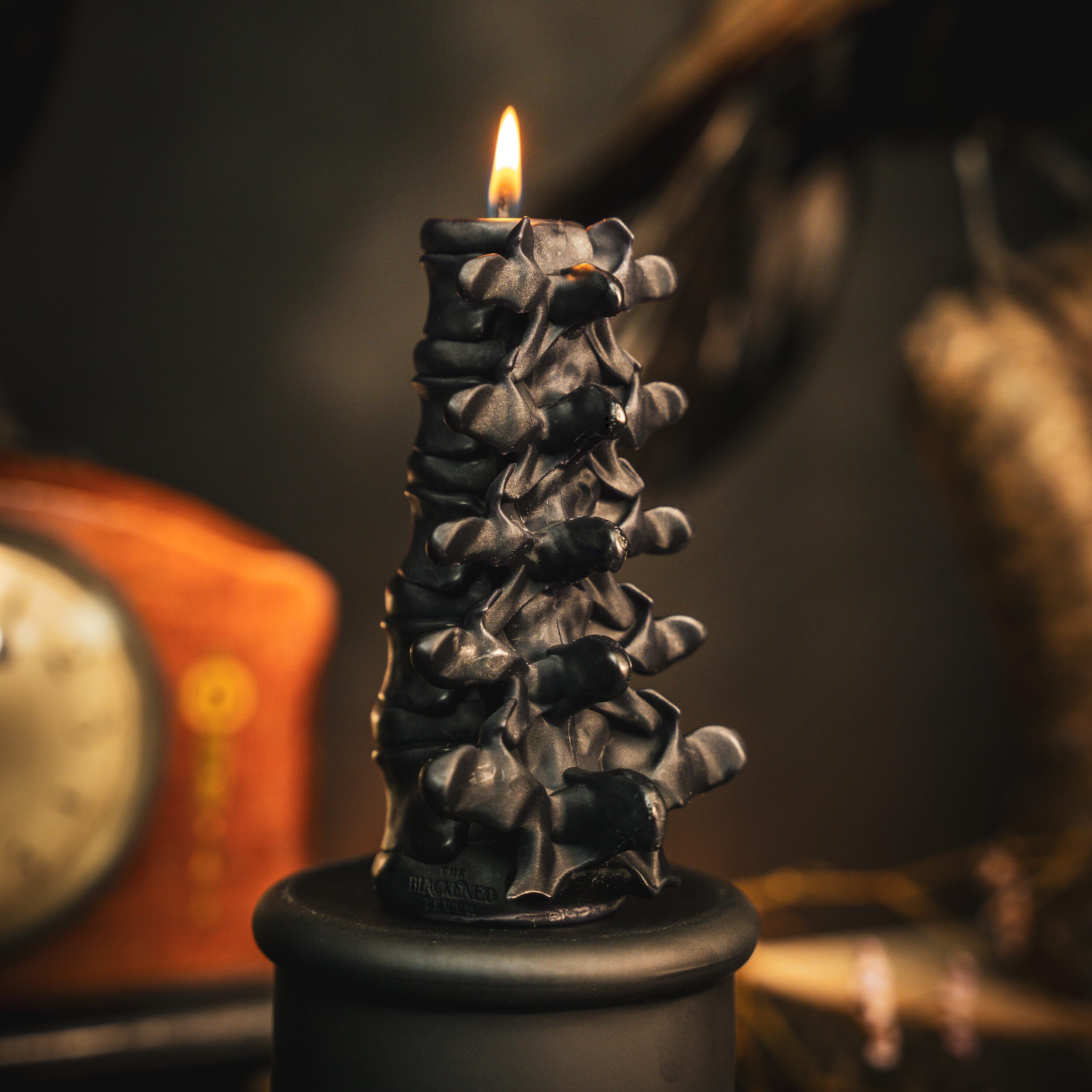 spine candle the blackened teeth gothic candles ossuary candle  gothic homeware