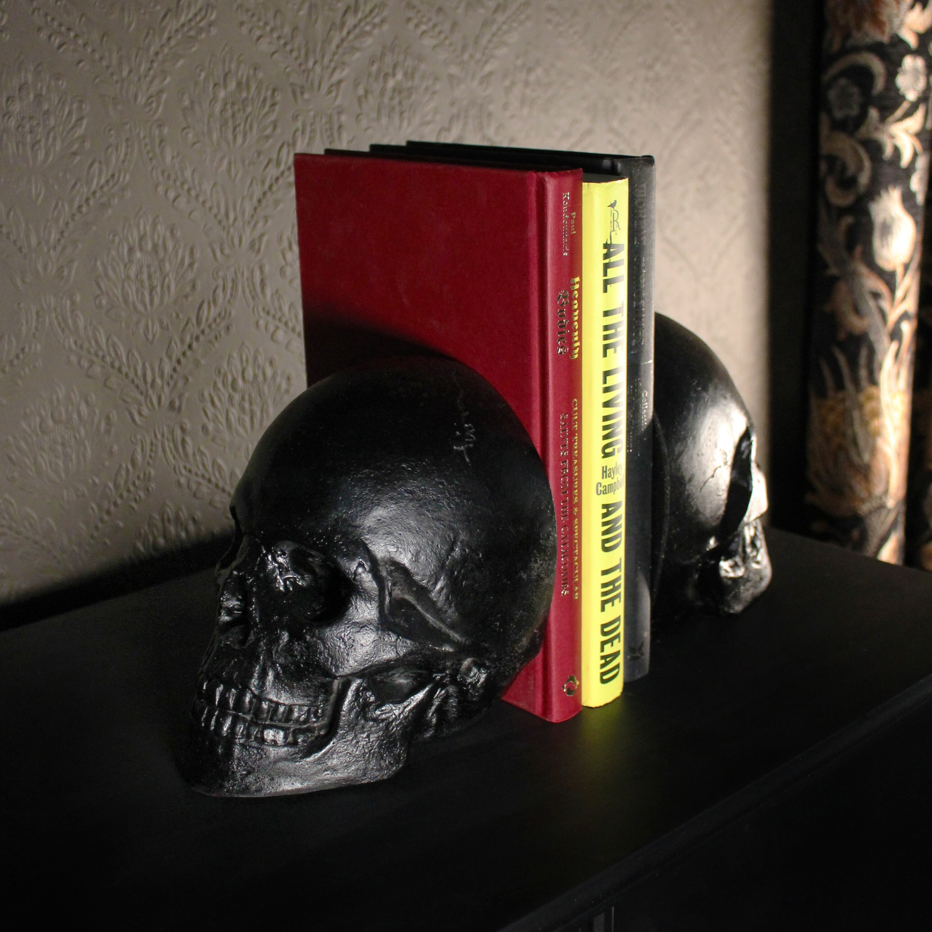 skull bookends gothic homeware the blackened teeth 