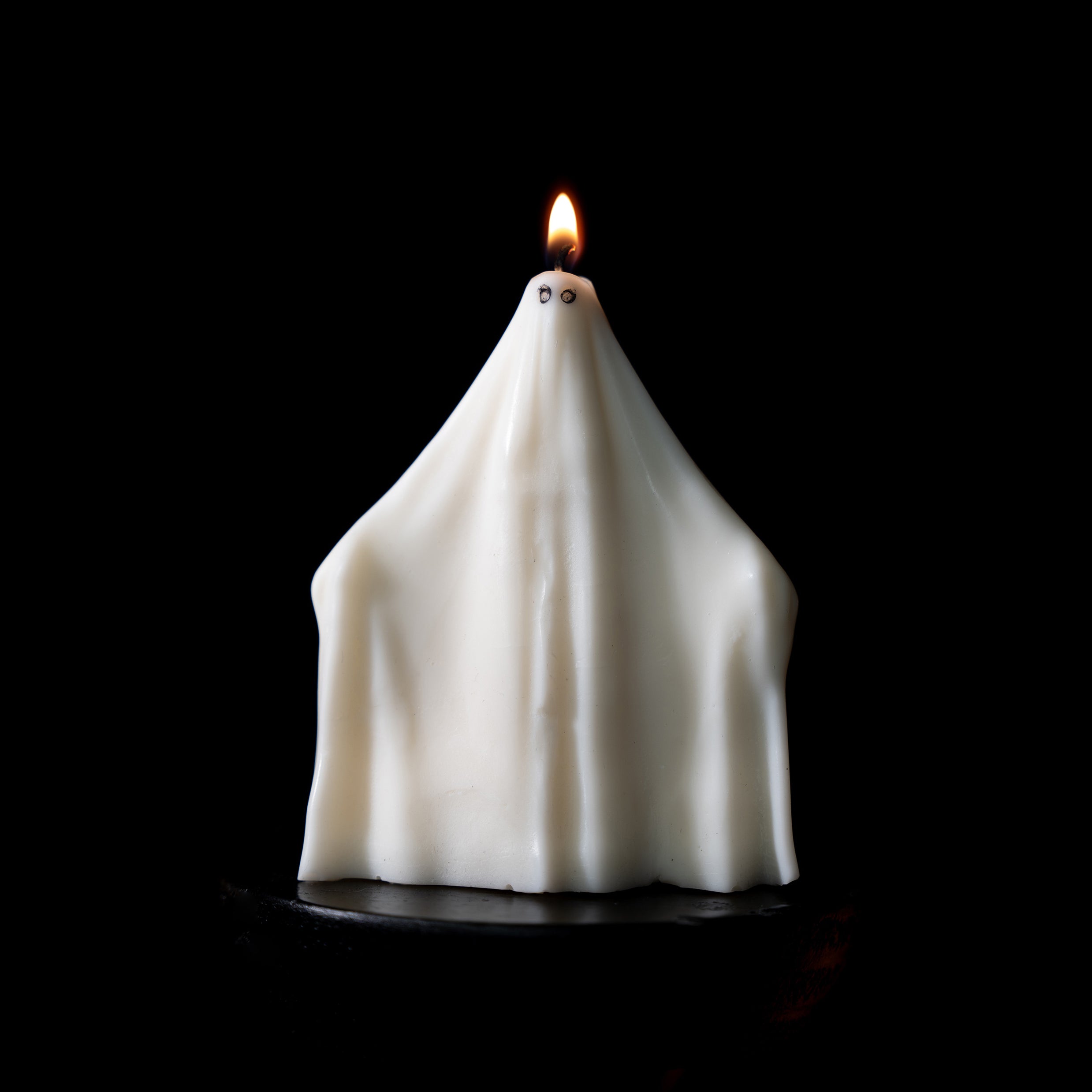ghost candle halloween candle the blackened teeth