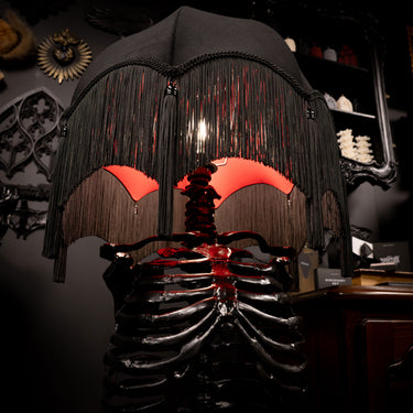 skeleton floor lamp in gothic living room with victorian gothic style decor black room
