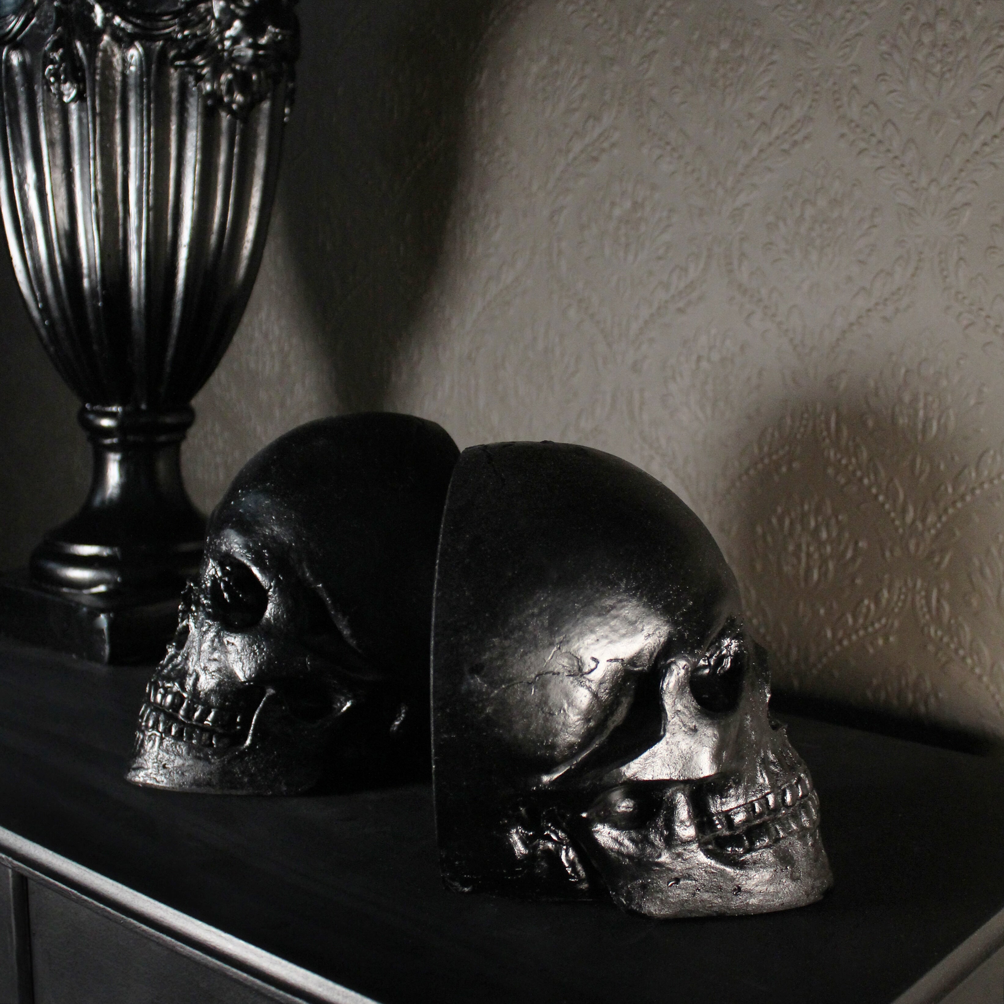 skull bookends gothic homeware the blackened teeth 