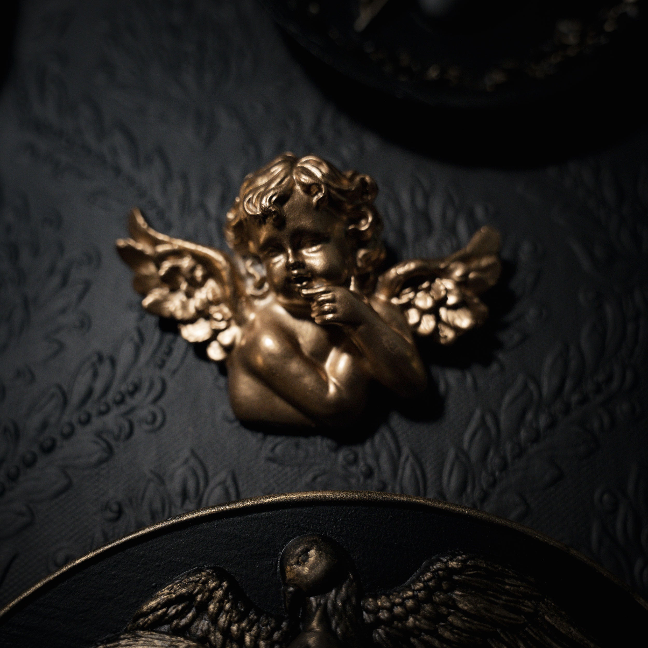 small golden cherub wall plaque gothic home decor by The Blackened Teeth Ltd