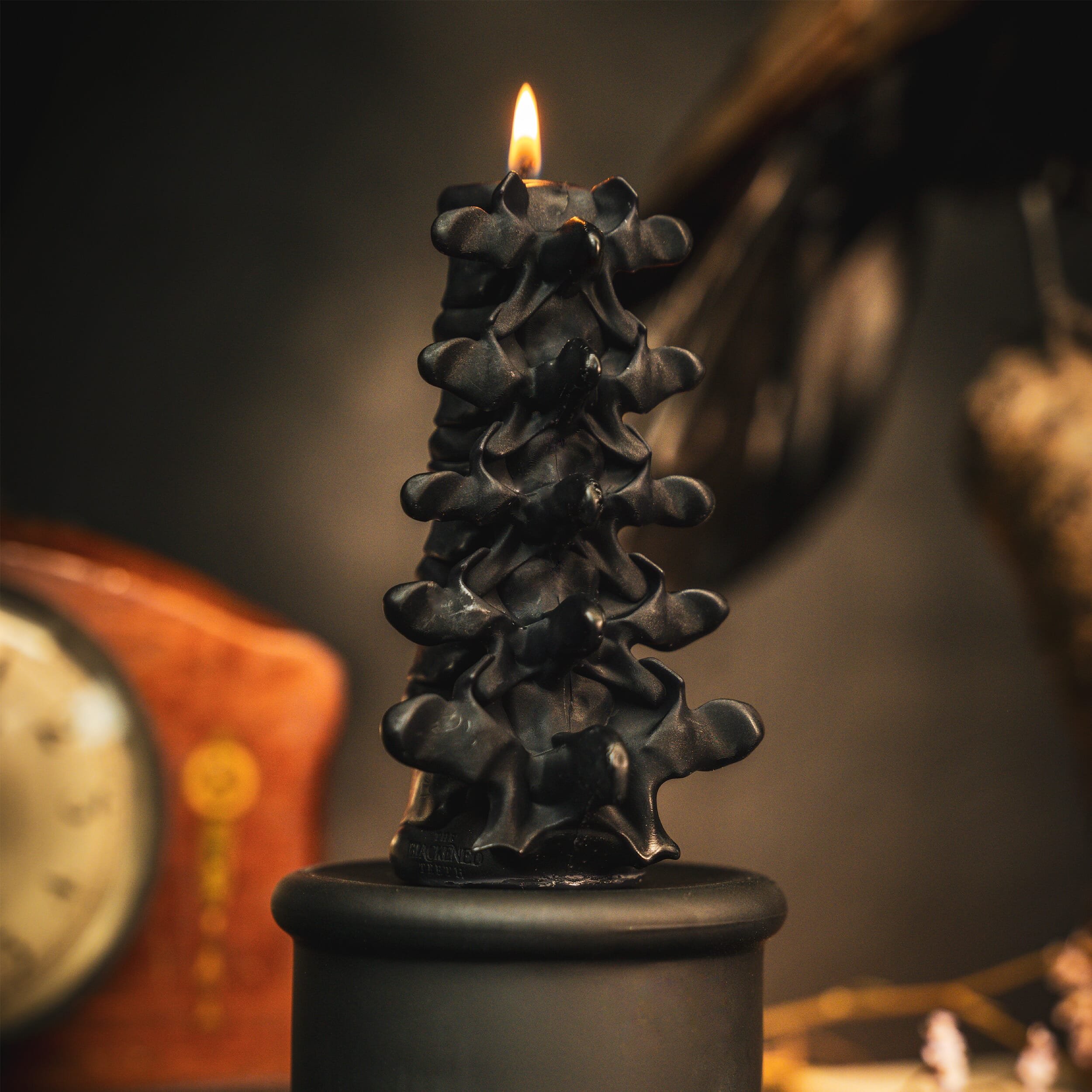spine candle the blackened teeth gothic candles ossuary candle  gothic homeware