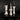 LARGE WHITE VASE COLUMN THE BLACKENED TEETH THE BLACKENED ABODE